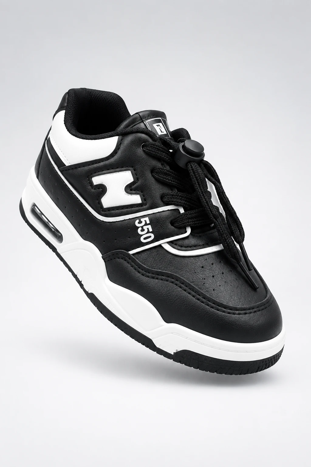 ونس بچگانه وارداتی طرح New Balance 550 - مشکی سفید (بند تزیینی)